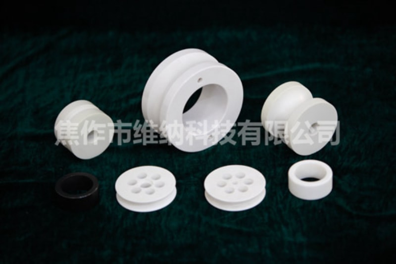 Wear resistant ceramic guide wheel